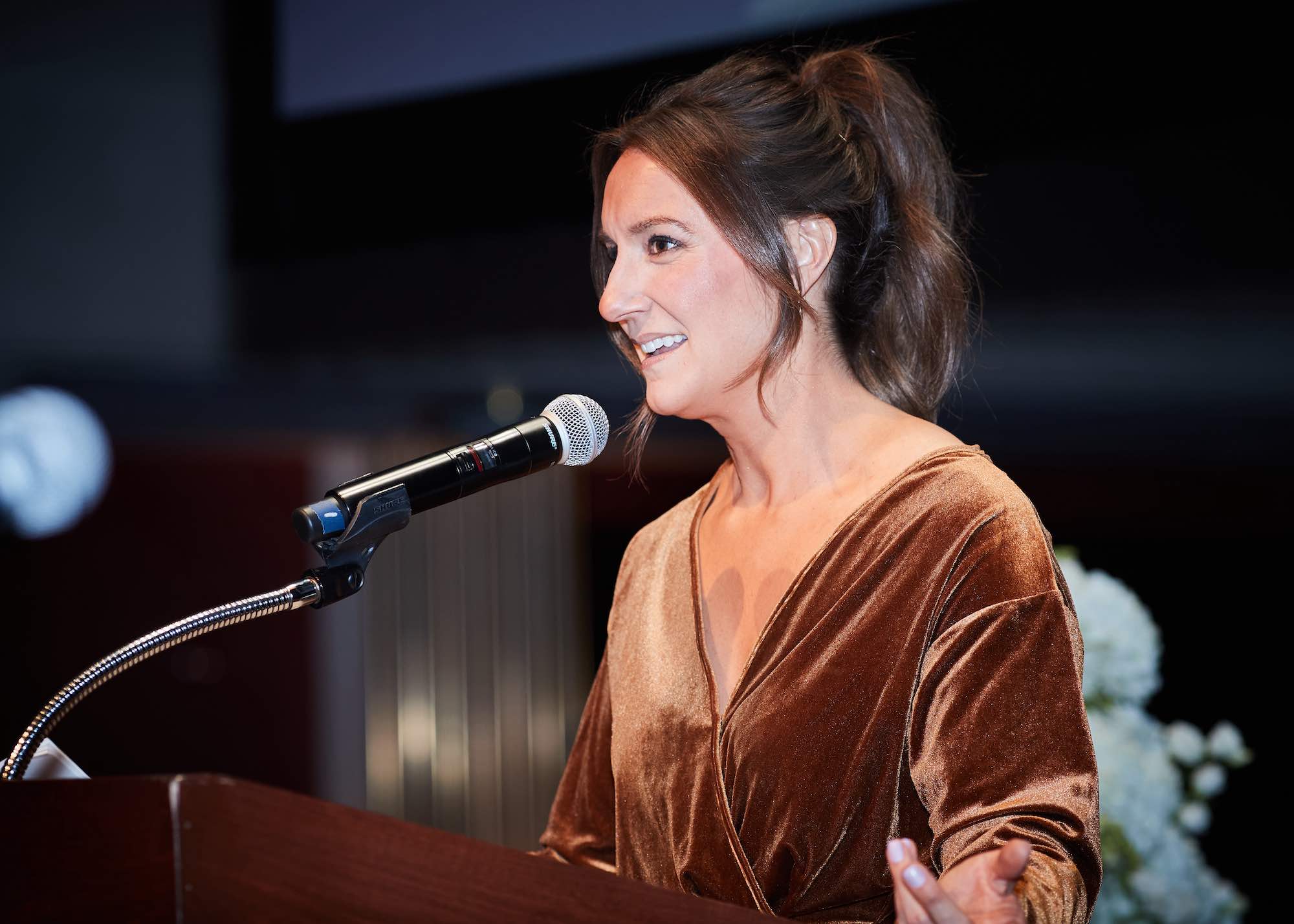 Emily Deem from Fox 11 News in Green Bay speaks at Uplift for the Boys and Girls Clubs of the Fox Valley